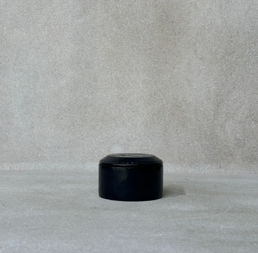 African small round black box