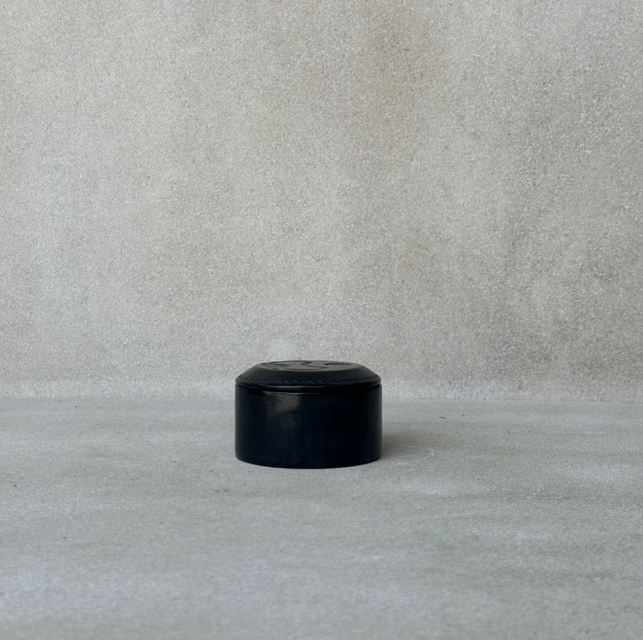 African small round black box