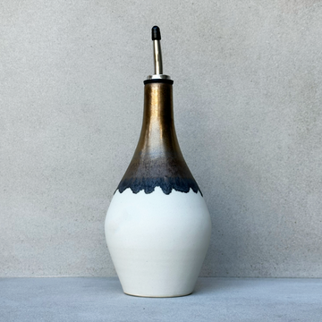 JWC Gold + White Oil Bottle