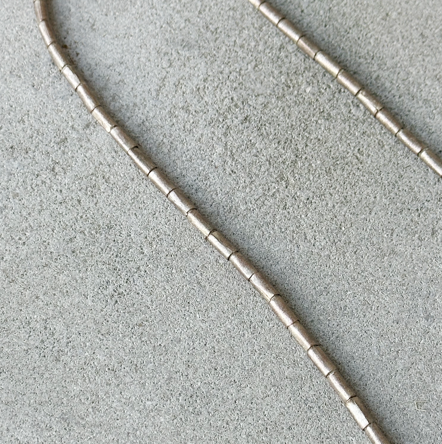 African Metal Bead Strand